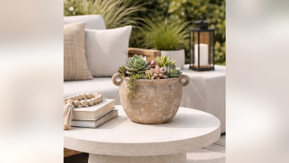 Get a vintage-looking pot for your garden with modern durability.