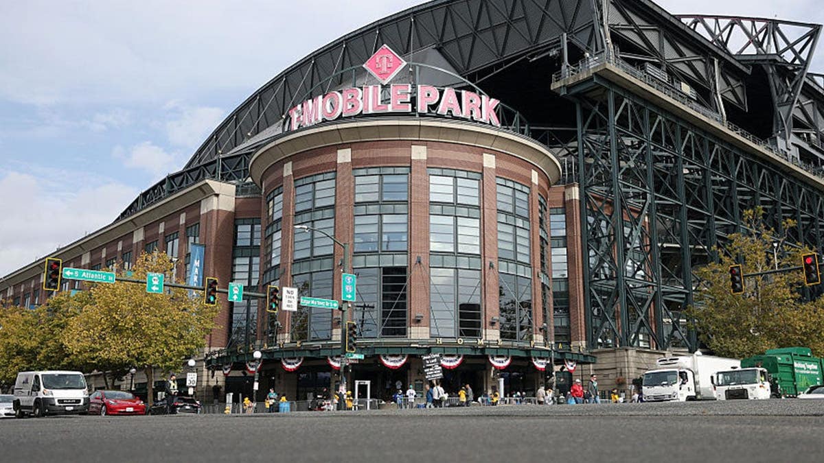 Fans enter T-Mobile Park