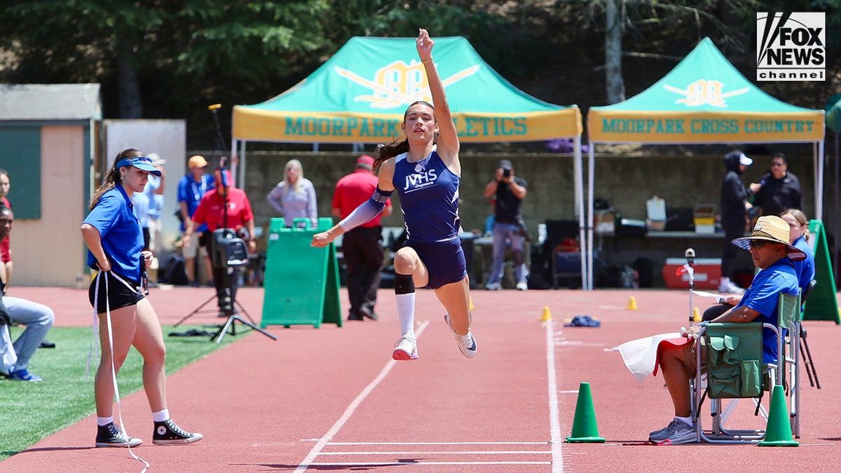 Transgender student athlete AB Hernandez running in a track and field event