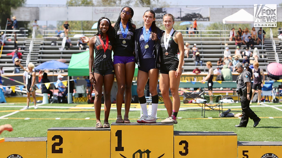 Transgender student athlete AB Hernandez posing with other track and field finishers in Moorpark, California
