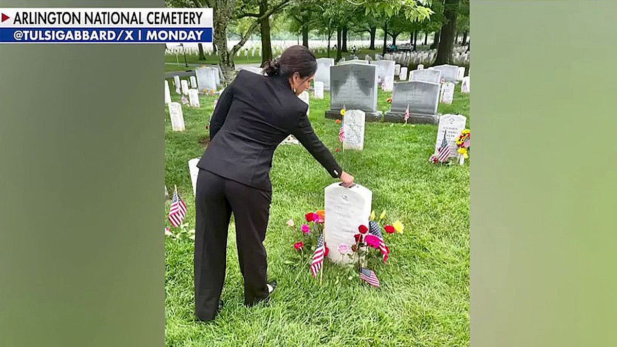 DNI Tulsi Gabbard at fallen soldier's grave