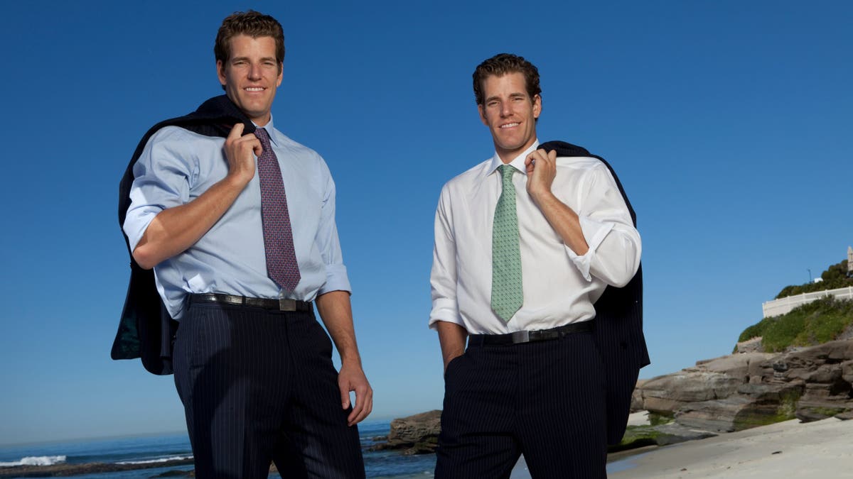 Tyler and Cameron Winklevoss standing near their home in La Jolla California