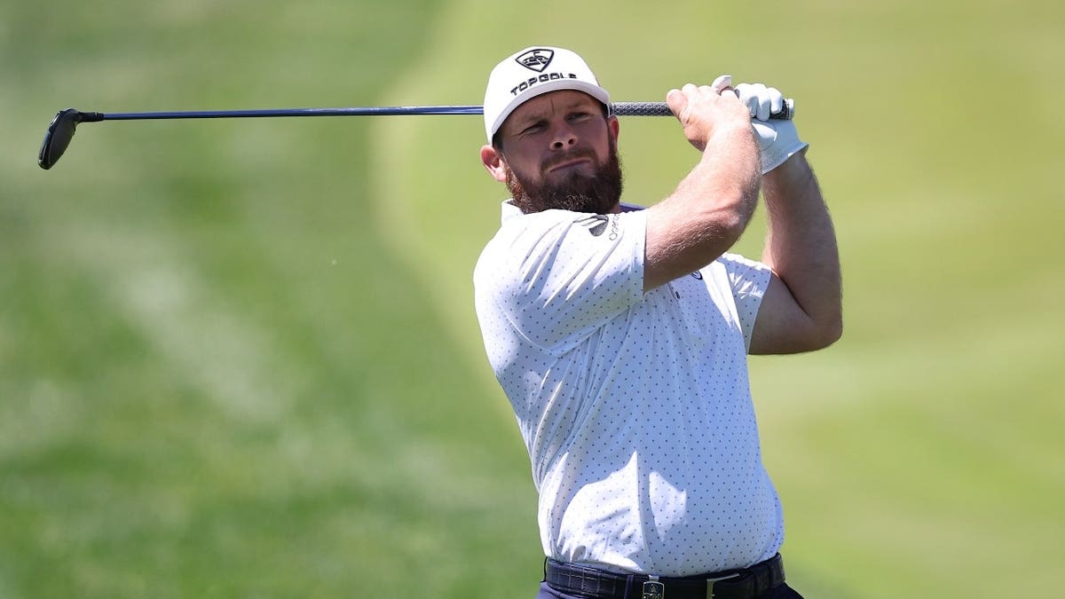 Tyrrell Hatton plays a shot on the eighteenth hole during a practice round of the 2026 PGA Championship at Aronimink Golf Club in Newtown Square, Pennsylvania.