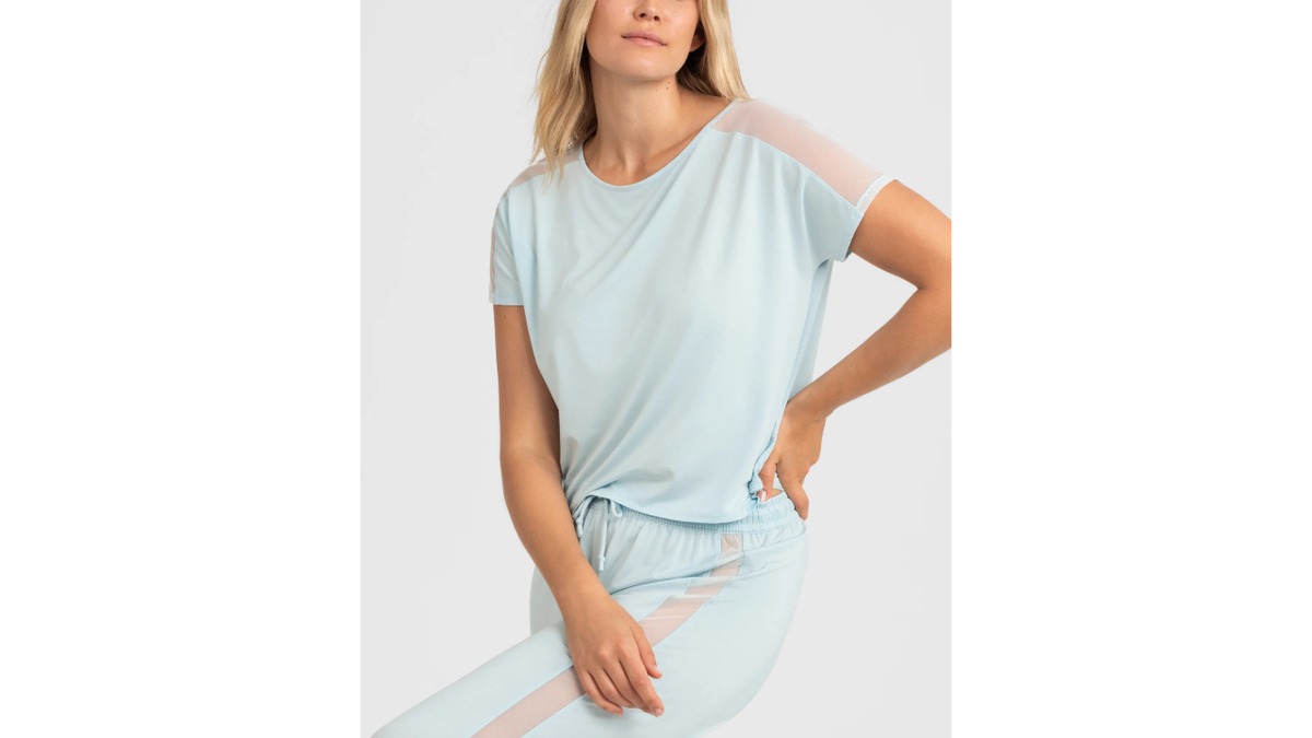 Stay comfortable in this cooling sleep top with mesh panels.
