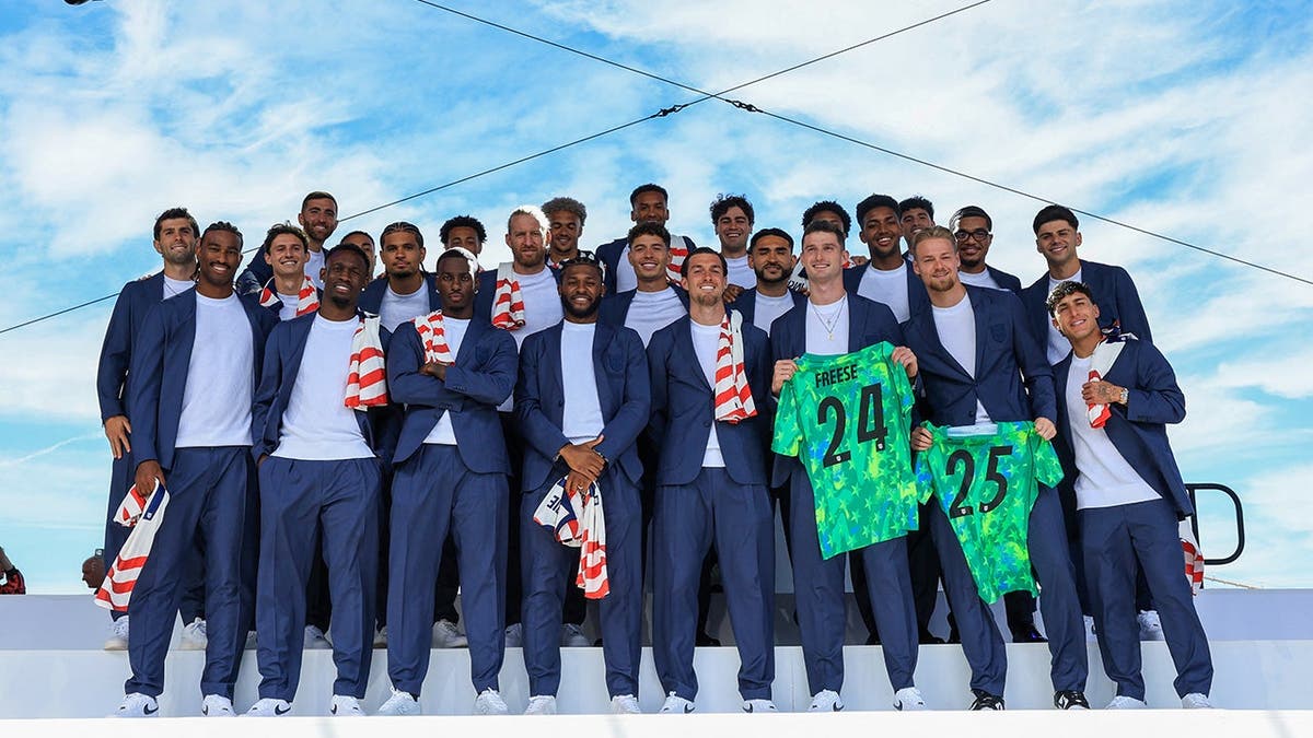 The US Men's National Team posing for a group photo in New York.