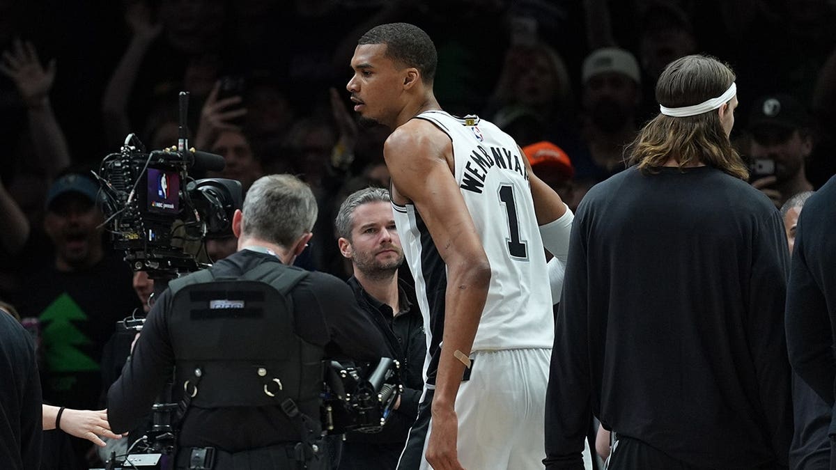 San Antonio Spurs guardant  Victor Wembanyama reacting aft  ejection during NBA playoff game