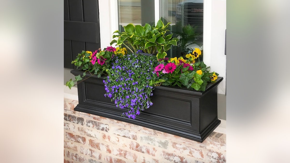 This well-crafted planter box looks stunning anywhere.