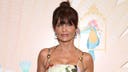 Helena Christensen soaks up the sun in strapless swimsuit after turning heads at Cannes Film Festival