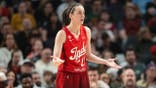 Caitlin Clark reacting after a foul call during a WNBA game