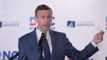 DNC chair Ken Martin makes a speech during the press conference for the DNC site visit at Ball Arena in Denver, Colorado