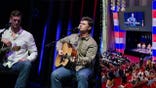 Veterans perform onstage before a packed audience during a patriotic music showcase at the Trump Kennedy Center.