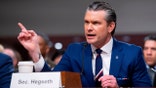 Pete Hegseth testifying before a committee on Capitol Hill.