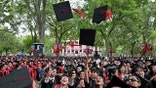 Undergraduates cheer during commencement ceremony at Harvard