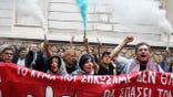 Pro-Palestinian protesters wave flags and hold smoke flares during a demonstration in Athens over Israelu2019s interception of the Global Sumud flotilla.
