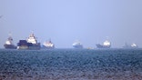 Ships anchored in the Strait of Hormuz off Bandar Abbas in southern Iran