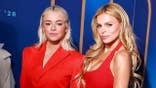Livvy Dunne and Brooks Nader posing on the red carpet at New York City Center