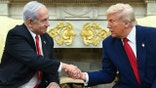 Israeli Prime Minister Benjamin Netanyahu shakes hands with President Donald Trump