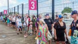Passengers from Norwegian Cruise Line Breakaway ship waiting in a queue in St John's Antigua and Barbuda