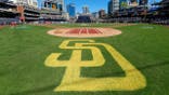 San Diego Padres logo displayed on the field at PETCO Park.
