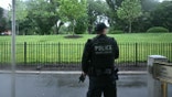 An armed Secret Service agent reacts at the White House