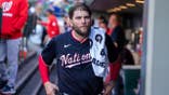 Trevor Williams of the Washington Nationals sitting in the dugout.