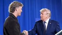 Donald Trump posts support for Giants QB Jaxson Dart on Truth Social after teammate Abdul Carter called him out for introducing the president on stage.