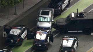 Rideshare passenger held hostage for eight hours during armed standoff with police in swanky neighborhood