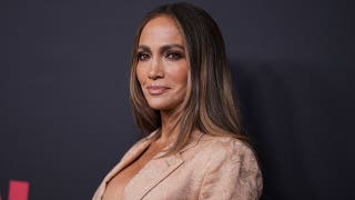 Jennifer Lopez flashes her toned abs in tiny white bikini as she enjoys pool time session