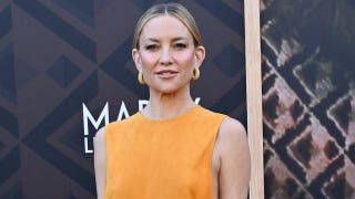 Kate Hudson turns heads in bold yellow dress with revealing cutouts while on the red carpet