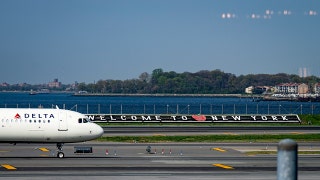 LaGuardia Airport AI hologram answers traveler questions
