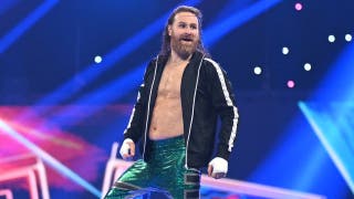 Sami Zayn turns his back on Cody Rhodes during Gunther's post-match attack
