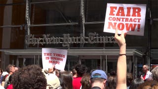 New York Times staffers rally outside headquarters demanding fair contract and AI protections