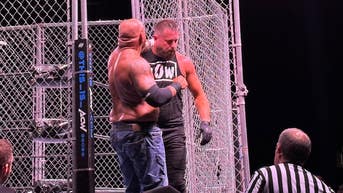 Packed arena turns ugly after steel cage match leaves champion on a stretcher - Fox News