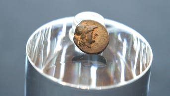 Teen stumbles on mysterious coin from legendary city, puzzling archaeologists over its journey - Fox News