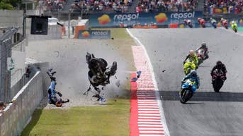 Rider hurtles through air as bike rips apart in Catalunya Grand Prix - Fox News
