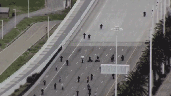 Video shows cops deploy drones to help trap dozens of bikers in massive bridge takeover - Fox News