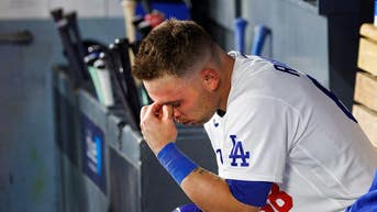 Dodgers star smashes bat over his own helmet three times after ugly strikeout - Fox News