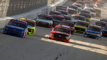 NASCAR tire carrier saves reporter from runaway pit box before Craftsman Truck Series race - Fox News