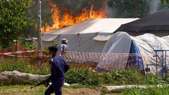 Angry mob torches Ebola treatment center in Congo after dispute over victim's body - Fox News