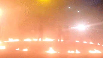 Street takeover erupts into fire-filled chaos as masked suspect waves flamethrower - Fox News