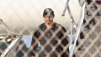 Tiger Woods lands in Florida with facial hair and a dog after inpatient care abroad - Fox News