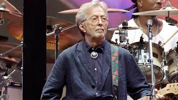 Eric Clapton hit in the chest by fan-thrown object, cuts concert short