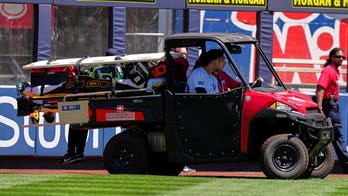 Yankees' Jasson Dominguez carted off field in tears after crashing into outfield wall after stunning catch