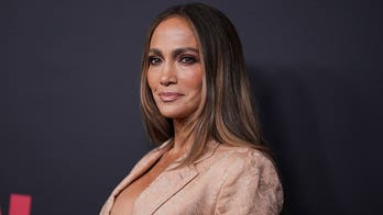 Jennifer Lopez flashes her toned abs in tiny white bikini as she enjoys pool time session