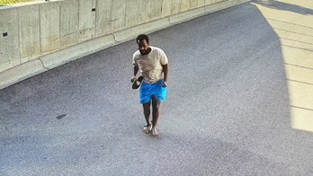 Minnesota fraud suspect who jumped from building is arrested, FBI says