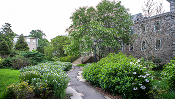 Liberal arts college drops prof’s name from campus hall after grave dig controversy