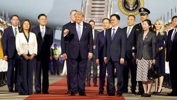 Trump turns Air Force One into a boardroom — and dares China to blink