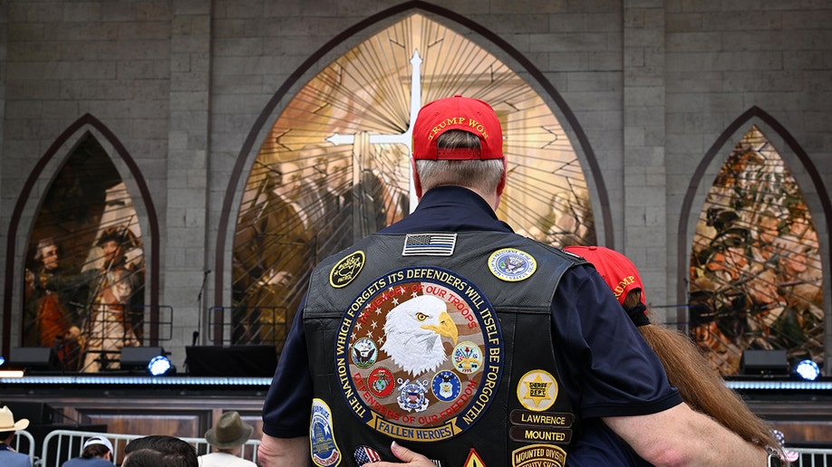Attendees embrace during the National Jubilee of Prayer, Praise & Thanksgiving on the National Mall in Washington, DC, US, on Sunday, May 17, 2026.