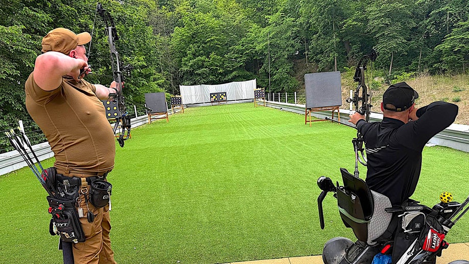Ukrainian injured vets practicing archery.