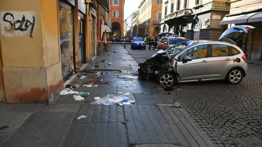 Several injured after car plows into crowd; passerby allegedly stabbed by driver
